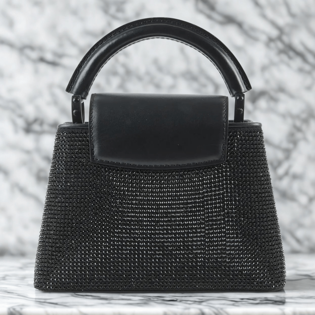 Louis Vuitton – Capucines East-West Mini Tasche