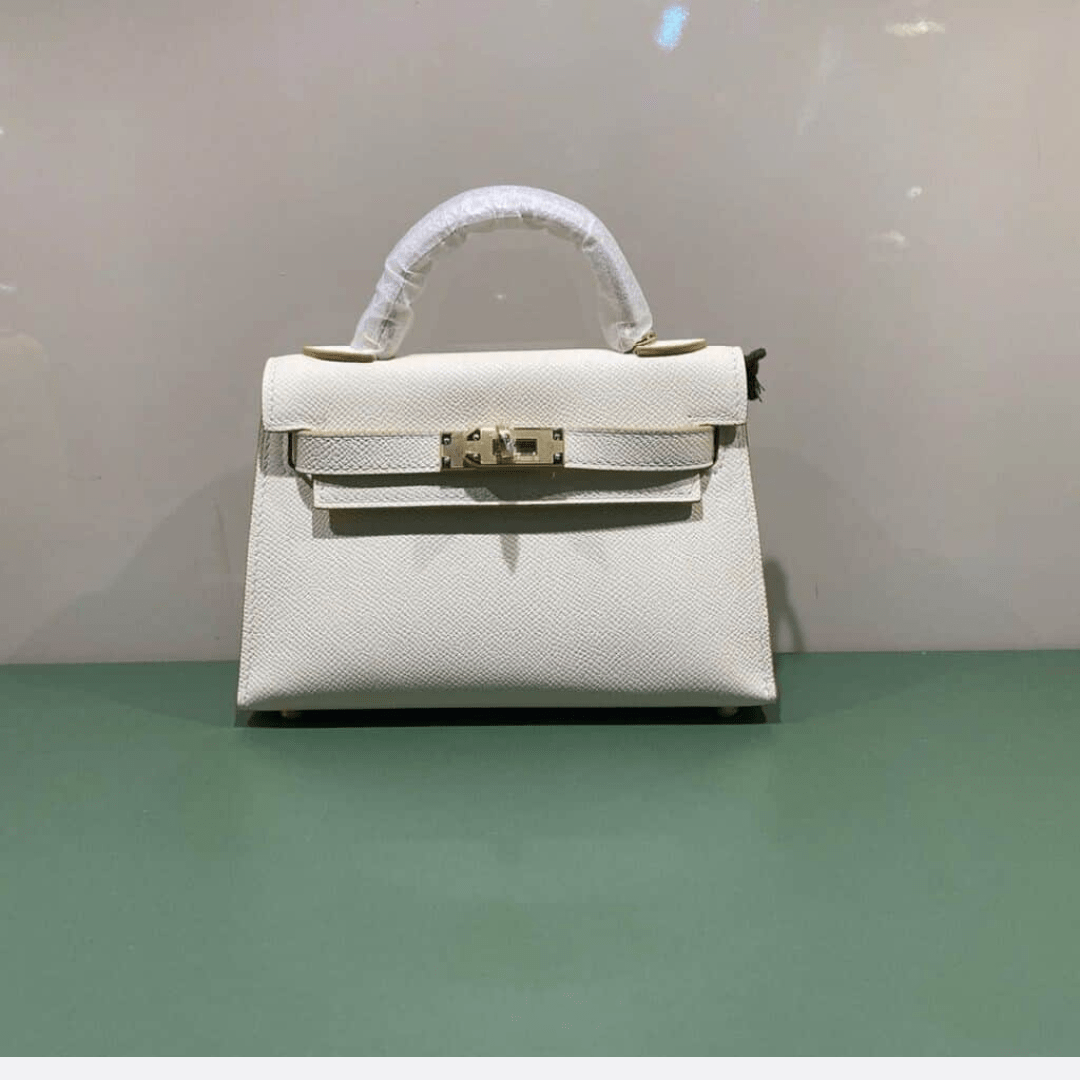 Hermès Kelly 20 Tasche mit goldener Hardware in Offwhite