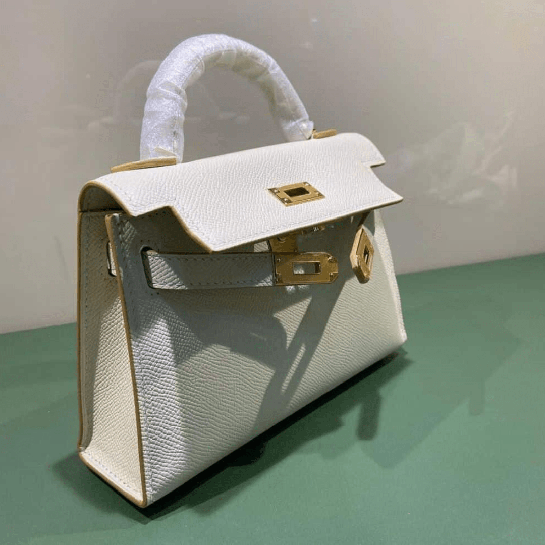 Hermès Kelly 20 Tasche mit goldener Hardware in Offwhite